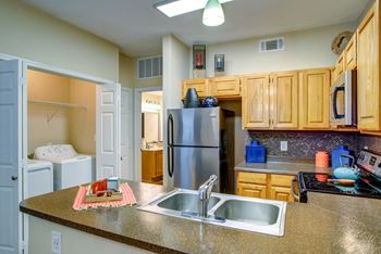 Double Sink With Integrated Sprayer at Pavilions at Northshore Apartment Homes, Portland, TX, 78374